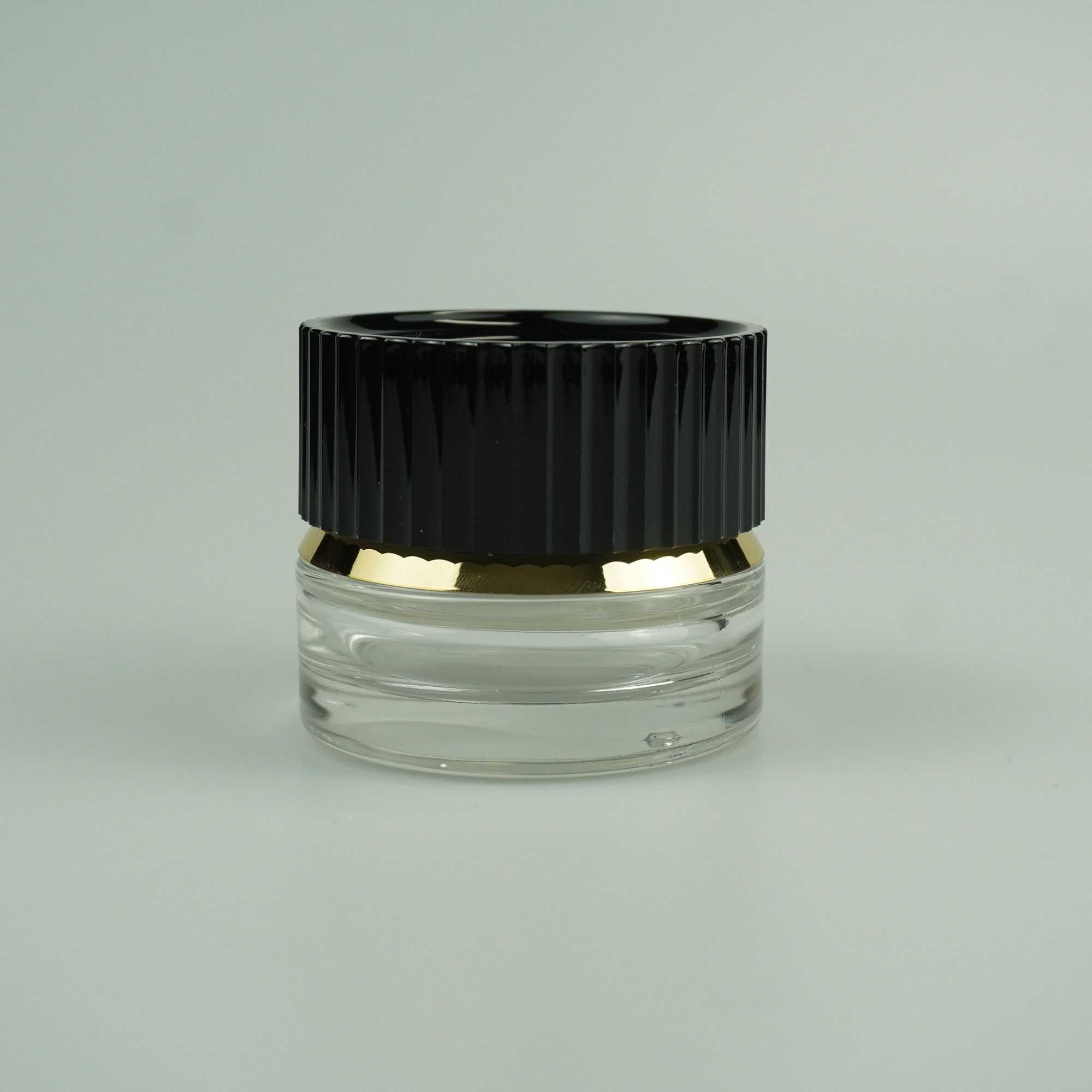 30‑100ML Round Clear Glass Bottle & Jar Set With Black Ribbed Gold‑Trim Cap